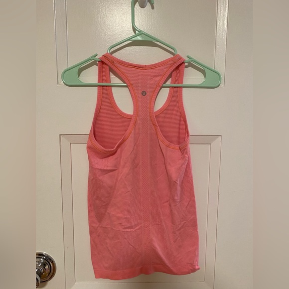 2 older lulu swiftly tech tank tops - Picture 5 of 9